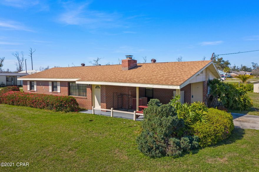 CURRENTLY UNDER CONTRACT, SELLER ACCEPTING BACKUP OFFERS This home offers room to grow. Enjoy the privacy of a large lot with plenty of parking, no HOA and your lender will not require flood insurance , This large lot offers RV parking and ample room for work shops and storage. As  you first pull into the carport area you will notice a large outdoor cooking area great for outdoor grilling or oysters,  plenty of room for entertaining friends and family, in the kitchen you have plenty of options for counter space and seating. This home is on city water and city sewer, the sellers opted to keep the well for irrigation with many water spikets around the property. Seller also states that this lot can be divided and would be great for a mother in law suite or an investment property.