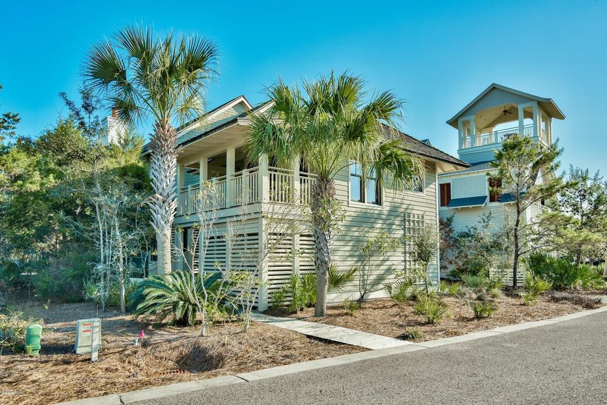Phenomenal opportunity to own the best priced home within WaterSound Bridges! Private and serene setting just 200 ft. from the breathtaking boardwalk to the beach. Surrounded by ultra luxury homes and a natural environment, this location stands apart from the rest. The accessibility to amenities is superb with a manicured green space bordering the left side of the home and a fantastic pool & sun deck next to that. A pond and walkway is directly across the street from the front of the home and the rear boasts permanent views of Camp Creek Lake, rare coastal dunes and the emerald green waters of the Gulf of Mexico. This is a stunning custom built 4-bedroom home & 1br carriage home designed by Tom Christ that is being sold fully furnished and beautifully decorated with inviting coastal decor! The home is complete with a 2-car garage with guest quarters above including a beautiful granite kitchen and ensuite bathroom. There is an additional storage closet below that is the perfect size to store bikes to enjoy the area with. The main home features a first and second floor master suite making this home perfect for large families. It would make a great rental property or full time residence. Currently the home is a non-rental and is very well maintained. Attention to detail is apparent and every nook of the home has been thought out. Even upon entry by the stairwell there is a lounge area and small wet bar including a sink, wine fridge and ice maker. Stunning hardwood flooring extends throughout the home with beautiful tile and granite in the bathrooms. The lower level master is fantastic with a private screened-in porch offering secluded, wooded views of the park and there is a stairwell that leads to the upper level balcony where you can take in the Gulf views. This master has a walk-in closet and en-suite bathroom with large soaking tub, separate shower and double vanity. There are two additional rooms downstairs each with ensuite bathrooms. One room offers two twin beds and the other is currently being used as an additional living area. 

The upper level features an incredible great room with high vaulted wood beam and paneled ceilings with built-in recessed lighting and an incredible gas fireplace with masonry surround. The living & dining area opens up to a spacious balcony with views of the dunes, lake and Gulf of Mexico. This is a great place to relax, dine or entertain and there is uniquely a stairwell that leads to the lower level screened-in porch. 

The kitchen is also impressive with granite countertops and breakfast bar, beautiful natural wood custom cabinets, white farm sink and high end Viking appliances. The gas range stove, microwave and oven are stainless steel and the fridge and dishwasher have custom wood fronts to blend in perfectly with the cabinetry. There is a pantry for additional storage and a half bath on this level for convenience while entertaining. 

The upper level master suite offers Gulf views, wood flooring, beautiful vaulted ceilings and an en-suite bathroom with walk-in shower and double vanity. There is also a private Juliette balcony with great sunset views. Exterior finishes include a combination of wood lap and shingle siding and a wood shake roof with copper flashing along with a paver stone driveway. The floor plan will accommodate large families and the location is prime with the easy access to amenities and the beach!