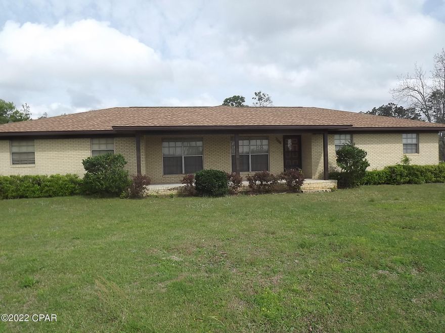 This is a Beautiful home that needs updating and some TLC, The grounds encompass 1.76 fenced acres and a large two car garage with with the possibility of a Work Shop or a She Shed. The interior of this home is in very good condition it just needs updating. This home boast very large rooms, a den and an pantry/laundry/sewing room. This home is ideal for entertaining Family and Friends and has a beautiful large fenced yard for kids to play in or for you to sit back and enjoy the country style life.  The detached Garage offer two large bays and a workshop/hobby shop away from the house. This home is also with in close proximity to Bear Creek and Deer Point lake boat ramps. Excellent property so make your appointment to check it out today.  There will be additional picture coming shortly.