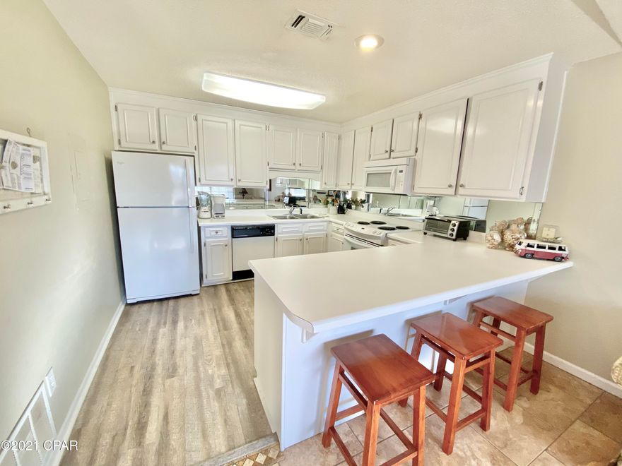 CURRENTLY UNDER CONTRACT, SELLER ACCEPTING BACKUP OFFERS-Very close to the beach! This unit offering 1 bedroom/1.5bath, plus bunks in the hall,  is only a couple minutes walk to the beach and close to all the amenities!  Horizon South is a highly sought after gated community that offers multiple pools, tennis mini golf, basketball courts, club house, and direct beach access.  This unit is un the 2nd floor so you will enjoy vaulted ceilings with no noise above you.  Interior features include updated flooring, cabinetry, spacious bedroom with walk-in closet, and additional vanity in bathroom.  HVAC was replaced 8/2015, Water Heater in​​‌​​​​‌​‌​​​​‌​​‌​​​​‌‌ 2/2019.