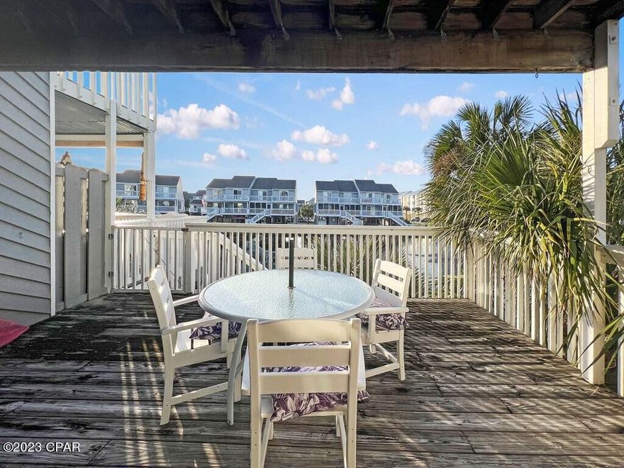 SPACIOUS MULTI-STORY TOWNHOME IN THE SOUGHT-AFTER COMMUNITY OF BARRIER DUNES! This is your chance to own the beach home you've been dreaming of with tranquil water views and a salt air breeze. 147 Parkside Cir offers a 2BD/2.5BA floor plan with an open concept living and dining area. Luxury vinyl flooring flows throughout the main level leading into a well equipped kitchen with peekaboo views of the bay. Breakfast bar seating and a welcoming window seat add comfortable areas for gathering with family and friends. Just off the living space is a nice size sun deck overlooking the pond ideal for outdoor dining and entertaining. Upstairs are 2 bedroom suites each with a water view from their private balcony. Outdoors, a covered patio adds extra leisure space perfect for a BBQ or fun outdoor activities. This space could also be used for covered parking or storing all of your beach toys. Along with multiple beach access points, this gated community offers some of the best amenities on the North Cape including two community pools, tennis courts, three stocked fishing ponds and a playground. Teeming with wildlife, take a golf cart ride through St Joseph Peninsula State Park and experience the sounds of native birds and old Florida foliage. Visit nearby restaurants for fine dining, fresh seafood and live entertainment all just minutes away. In an area with proven rental income, this townhome makes for an excellent investment. These affordable beach homes don't come available often. Don't delay! Take the 3D tour and call for a showing today!