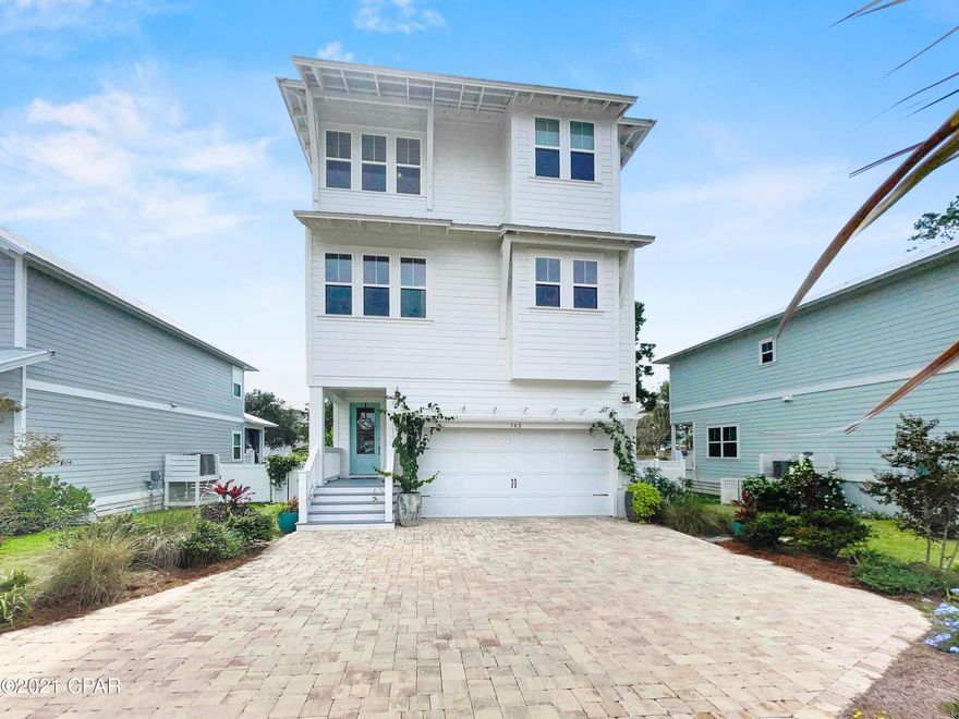 CURRENTLY UNDER CONTRACT, SELLER ACCEPTING BACKUP OFFERS. Immaculate and furnished, 3,152 sq ft, 4 bedroom, 3 1/2 bath beach house, located in the desired coastal dune community of Grand Pointe, Inlet Beach! This stunning property is located just minutes to the beach. The home features a full-service elevator for your convenience. First floor has a keyless entry & can be used as a 2nd master suite, additional entertainment area or rent out separately as a studio efficiency. Second floor boasts an open floor plan which includes a large living area, 1/2 bath, separate laundry room and a large kitchen. There is a whole house water filter, water softener and includes a sink reverse osmosis tap, quartz countertops, stainless steel appliances, vented hood, gas cooktop stove and a large island. The 2nd floor also features a nice size balcony that overlooks a privacy fenced south facing back yard paradise, loaded with tons of tropical fruits to include banana, avocado, papaya and more. On the third floor you will find the master suite, with a large walk in closet and master bath to include tub and separate shower. Enjoy your private master suite balcony, with peek a boo gulf views, that catch those warm salty breezes and sounds. The third floor also has 2 additional bedrooms and a separate full bath. Other highlights include a long driveway, large two car garage, with EV charger outlet and a tankless water heater for endless hot water. Located just off 30A , Rosemary Beach and a short bike ride and walk to many shops, Farmers Market, several diverse restaurants, bike paths, Camp Helen state park with many walking trails, and beaches with multiple public access points and state park beach. Other amenities include an oversized community pool and beautiful clubhouse, (that has been rented out for weddings), that overlooks Lake Powell. Enjoy access to the largest coastal dune lake in FL. Explore Lake Powell by kayak or launch your board at the community dock & paddle to the beach. It's also a quick drive to Panama City Beach Airport. There is so much to love about this property. Call today to schedule your private or facetime showing.

School Note : There is a new Magnet school linked to South Walton High located at Inlet Beach, called the Magnet Innovation Center (MIC), which is a unique STEAM school focusing on Science, Technology, Engineering, Art and Mathematics utilizing project based learning and instruction.