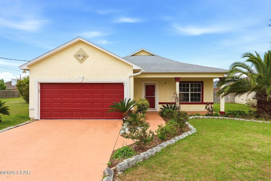 1412 New Hampshire Ave, Lynn Haven -- Well-maintained home in a quiet subdivision, ideally located near schools, shopping and both military bases. This open floor plan offers an oversized great room, a kitchen with breakfast bar, large pantry and generous laundry room. The primary suite includes a roomy walk-in closet and attached bath with dual vanities; two additional bedrooms share a Jack-and-Jill bath. Outside features extensive landscaping, a covered pergola over the back patio, a sprinkler system and a 12' x 20' storage shed. Perfect blend of comfort and convenience -- ready to move in.