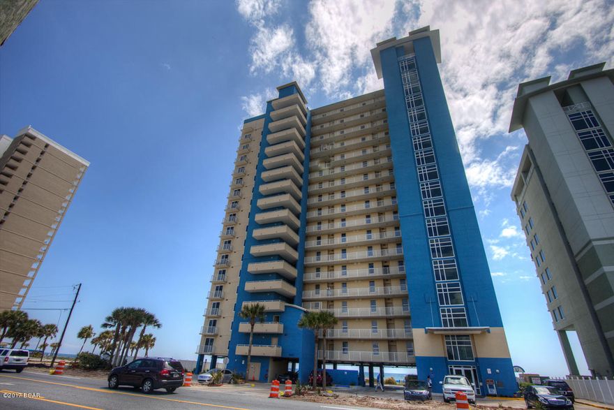 Don't miss out on this immaculate and beautifully decorated and furnished corner unit! The panoramic corner views are priceless. It has everything buyers are looking for. This 3 bedroom unit is very spacious and comes with tons of storage. The Gulf front master bedroom has a large walk-in closet and access to the balcony. It has a large master bathroom with double vanities and separate bath and shower. It has a large laundry room with a full washer and dryer and an additional closet for storage. The north end guest bedroom has its own private balcony. Seller added bunks in the office area so it sleeps 12 people! This unit also has high ceilings to allow in extra light for gorgeous views of the Gulf! See all the way to St. Andrews Park while eating dinner with the family at the dining room table. Grandview features two pools, fitness room and covered parking.