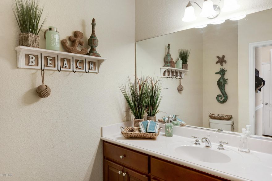 **BEAUTIFUL 4BR/3.5BA TOWN HOME WITH COMMUNITY POOL** CLOSE TO BEACH ON QUET WEST END** GULF-VIEWS** LESS THAN 1,000 FEET TO THE BEACH** The owners have used this 3-story, 2,100 square foot beauty as a second home so it is in fantastic condition. Interior features include crown molding, custom cabinets, granite counter tops and 18'' tile. Enjoy the outdoors with a fenced patio, two large balconies and a Juliette balcony off one of the guest bedrooms. There are only 10 units in this quaint, Mediteranean neighborhood. Located right around the corner from Inlet Beach and 30A and not far from Pier Park.