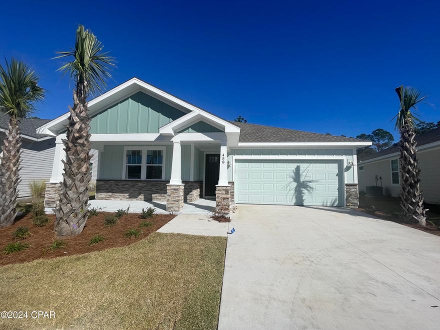 NEW CONSTRUCTION - Panama City Beach's desired Breakfast Point subdivision built by Southern Coastal Homes-Offering easy access to the white sandy beaches of the Gulf of Mexico, Publix shopping center, Breakfast Point Academy-rated A, & the famous Pier Park. INTERIOR features of this coastal inspired home offer a private Foyer entrance, large volume great room with an open floor plan, kitchen with center island, custom cabinetry with soft close drawers & stainless steel appliances, master suite with tray ceiling, tile shower, double vanity & large walk-in closet. Guest bedrooms with access to full bath, dining room, & laundry room. EXTERIOR of this home features a 2-car garage, covered porches in the front & back, fully sodded yard with sprinkler system.