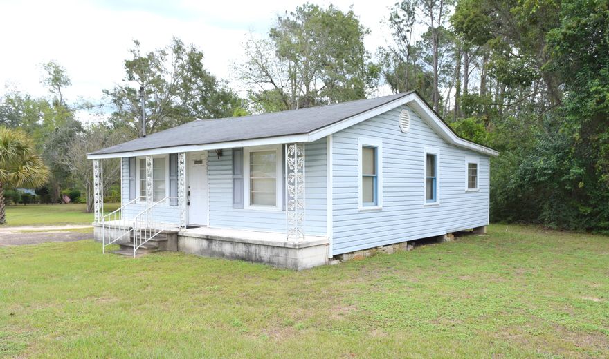 Commercial builiding located on Hwy 77. Properrty in need of some repairs but has great potential.