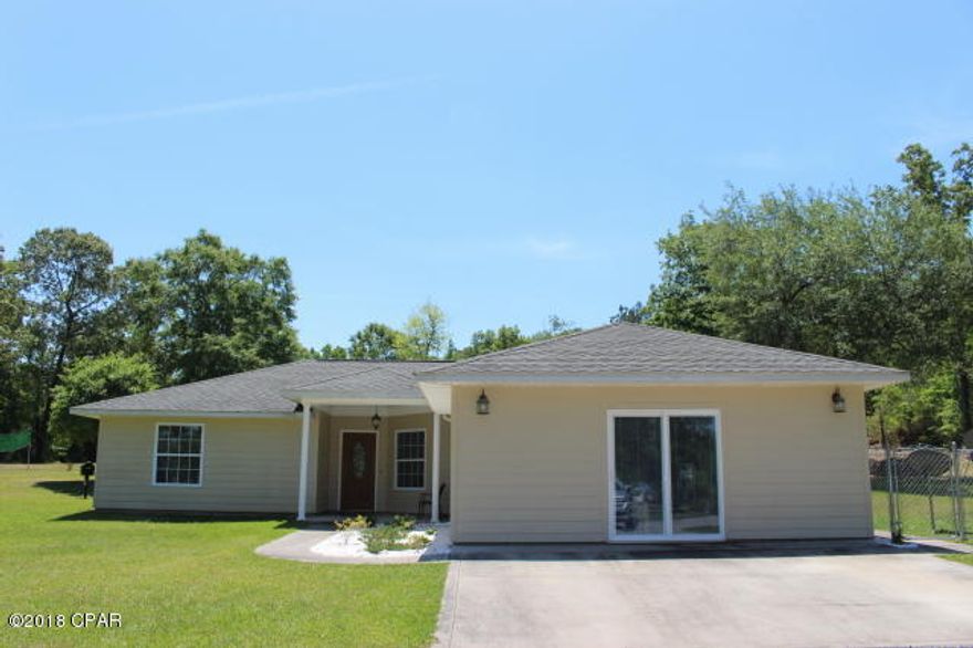 Still like new. Construction completed in 2010. 3/2 on 2.29 acres. Split bedroom floor plan. December 2017 new laminate plank flooring applied in LR/DR combo and all bedrooms. Closed in garage for more H/C living space. The 24x36 metal shop with electric,dusk to dawn light, windows, ceiling fans on concrete flooring is very clean. Lean to added for more clean space. You have your own shooting range on the property. The owner will also leave the custom built smoker & additional BBQ grill. Another bonus if you choose to take advantage, the owners have a boat slip at Lake Seminole Marina and can transfer to new owner and your cost would be $50. a month (there is a waiting list). Please See More Remarks 5 loads of coarse asphalt was brought in & pressed for the driveway then additional 2-3 loads of fine asphalt  to complete the job.  The paneled chicken coop will stay.  There is electric and water.  The home has extra blown insulation, hardie board siding, gutters, open covered back patio for entertaining, chain link fenced area for your pet and lots of out door lighting. Scattered oak trees through out and many loads of sod was laid to have such a beautiful yard.  Inside the home, there is double pane windows that pull out for easy cleaning, tile flooring in the kitchen & baths. All the stainless steel kitchen appliances will convey along with the washer & dryer.  The eat in kitchen has a pantry & recess lighting. The laundry room has cabinets above W&D for more storage. The guest bathroom has the tub/shower combo. There's a total of three sliding glass doors that were added. One from master bedroom gives you access to the back patio for quiet time. Master bath with double sinks, small step in to shower and there's his & her closets (hers will be the walk in).  Wood shelving replaced wire in the closets for sturdiness and for more space. As you preview this home you can clearly see the care that has been taken to keep the house in its present condition. High speed internet thru Hughes but is also available thru Centurylink phone company.
