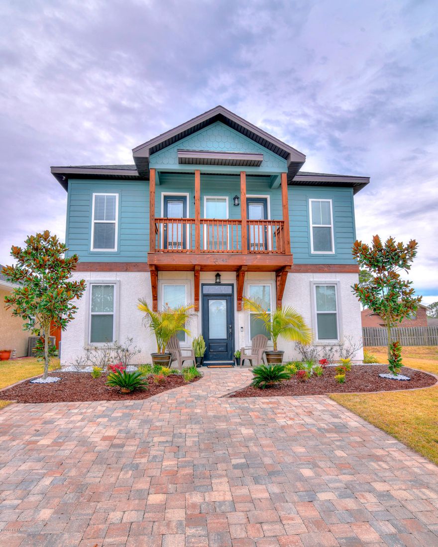 Stunning Rosemary Beach Style Florida cottage. 4 bedroom 2½ bath home has an open floor plan with large living area. The main living area features wood look tiles floors and 9-foot ceilings. The kitchen is well appointed with stainless appliances, dark wood cabinets, granite counter tops, and walk in pantry. Dining area features patio doors overlooking the fenced backyard. The first floor also includes a half bath and large owners retreat. The master bedroom includes walk in closet. Master Bath is also huge with double vanity sink, separate shower, and a cast iron claw foot tub. On the second floor are 3 bedrooms,bathroom, laundry room, and open area that could be an additional living area, office, play room… The front 2 bedrooms share a balcony- perfect for relaxing and watching a sunset. The exterior of the home is constructed of stucco and hardiboard siding, paver driveway, covered back patio, fenced backyard with storage building.The Hidden Lagoon community includes a pool, clubhouse, and barbecue area. Hidden Lagoon subdivision is tucked away on dead end street off North Lagoon close to restaurants, entertainment & grocery, and is near the Navy Base and Beach. All sizes and measurements are approximate-buyer to verify if important.