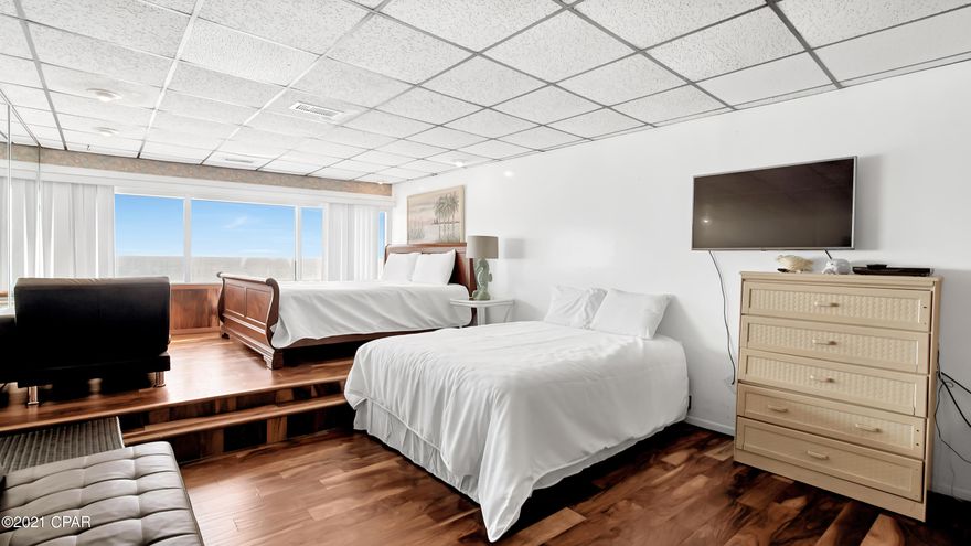 Best Priced Condo on the Beachside with Gulf Views! One of only four Penthouses. Located on the top floor with over 600 square feet of sweeping views of the beautiful Gulf of Mexico. This fully-furnished studio unit is in a low-rise building with only 6 floors and the elevator is close to the unit and to the white sugar-sand beaches. ALL UTILITIES ARE INCLUDED in the HOA fee: Electricity, Water, Trash, and cable/wifi. Situated in one of the best locations on the beach near Pier Park, Gulf World, and Sharky's Restaurant.