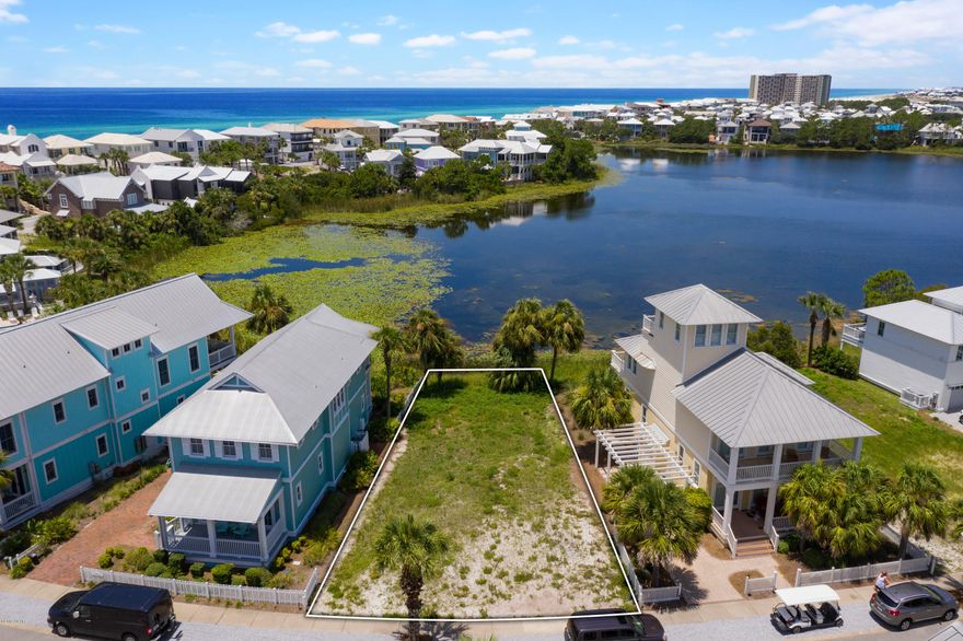 One of the last remaining lots in Carillon Beach, this 0.12-acre level building lot includes 41 feet of prime lakefront. Overlooking one of the rare dune lakes found in very few places in the world, this lot has a pleasant open aspect across the tranquil water for spotting migrating birds and wildlife. The westerly aspect provides stunning sunset vistas across the still waters, best enjoyed with cocktails from a comfy chair in a screened porch. This prime located lot is steps from the community pool, one of four in this gated resort community, when you seek a refreshing dip. Alternatively, head 500 yards to the sparkling white sandy beach and gorgeous emerald gulf, accessed by one of seven private beach access points. There's a free beach shuttle if you don't want to walk. And there's more This exclusive family-friendly resort has a true sense of community with well-maintained parks, tennis courts, hot tubs, a Beach Club, fitness center, yoga classes, salon, and spa. Walk or bicycle along the trails to Sweet Taste Wine Bar or Castaways Restaurant on Market Street Lakefront. It's the perfect place for a rendezvous with neighbors and friends when you live in this "Village by the Sea." Beyond the security gates, serene Lake Powell and Camp Helen State Park provide endless opportunities for kayaking, standup paddle boarding, fishing and boating. When you're not home enjoying this enviable lifestyle, your beautiful new home can generate vacation rental from guests.