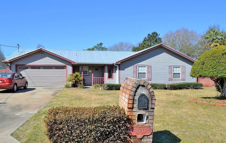 MOVE-IN READY HOME NEAR TYNDALL AFB! EASY MAINTENANCE! The interior features 3 bedrooms, 2 baths, an open floor plan (great for entertaining), 18'' tile flooring (No Carpet), a vaulted ceiling in the Living Room, good natural light and a 2 car garage. The kitchen boasts plenty of counter and cabinet space, a breakfast bar and a new stainless steel gas stove/oven - perfect for cooking! The exterior features a large fenced backyard, a covered front porch, a back patio and a small yard building for lawn equipment storage.