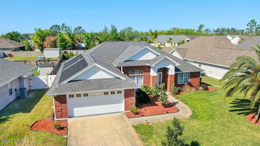 BEAUTIFUL HOME IN THE HAMMOCKS WITH AN IN-GROUND POOL! This spacious home features 3 bedrooms, 2 baths, an open floor plan with split bedrooms (great for entertaining), 10 ft ceilings, 2 dining areas, a good size family room with gas fireplace, a large interior laundry room and a 2 car garage with peg board for tools. The kitchen boasts granite counters, stainless steel appliances, a pantry and a long breakfast bar. The master bedroom can accommodate king size furniture and has an adjoining master bath with double sinks, Jacuzzi tub, separate shower, and walk-in closet. The other two bedrooms are good size and share the hall bath. The exterior features a newer roof, a covered back porch, a saltwater or chlorine in-ground pool (recently re-plastered) with waterfall and solar water heater, a privacy fenced backyard with fruit bearing trees, attractive landscaping, a sprinkler system on well, and a storage shed. This home is conveniently located in a sidewalk community that has underground utilities and a community pool.  Call today for your own private preview.