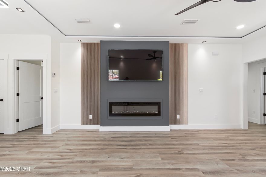 This move-in-ready, 3-bedroom, 2-bathroom gem is a rare find that perfectly blends modern convenience with an unbeatable layout for both homeowners and savvy investors. As soon as you step through the door, you'll be captivated by the seamless open-concept design, anchored by a stunning custom media wall. This impressive focal point features a cozy fireplace and comes complete with a 75-inch TV, offering an immediate ''wow factor'' for potential tenants or a turnkey start for a new owner. The home is thoughtfully designed for privacy, utilizing a split-floor plan that places the spacious master suite on one side of the house and the additional two guest bedrooms at the opposite end, creating a highly desirable floor plan that maximizes comfort.

What truly sets this property apart and makes it unique is its incredible outdoor versatility and dual street access. While the front entrance welcomes you on Kirkland Avenue, the oversized backyard opens onto Cedar Avenue, providing a unique accessibility feature that is nearly impossible to find. The expansive lot can easily accommodate a boat and an RV, or even two full-sized RVs, offering a massive value-add for tenants with toys or those needing extra storage. Whether you are a first-time homebuyer looking to take advantage of first-time home buyer programs or an investor seeking a high-demand rental with a ''set it and forget it'' interior, this home is must see. No HOA -No Flood Zone. Call today to secure this incredible opportunity!