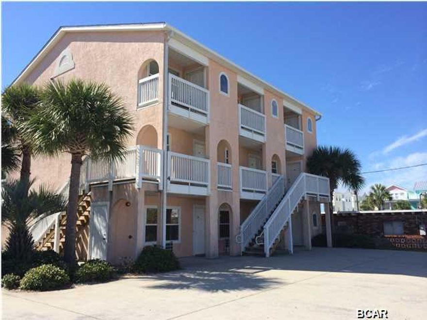 SELLER SAYS BRING ALL OFFERS!!! BETTER THAN EVER. Completely painted from top to bottom inside and outside. Cabinets are back to white! Gulf Views on the top deck. Completely furnished ready to go. The 2 bed-2 bath townhouse units rarely go on the market at this property. Here's your chance! Fully furnished located in small well maintained property on the quite east end of Panama City Beach. Low density family oriented property with gulf views from the 3rd floor balcony. Great vacation home and rental property located on the east end of Thomas Drive. Very close to St Andrews State Park, local fishing, boating and dinning. Property has a great gazebo with picnic area and pool for family summer fun. Only steps to the beach! AC Replaced in 2013.