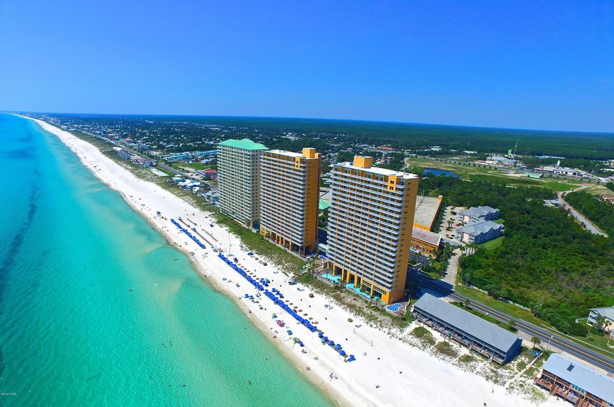 SUMMER INCOME 2020 -- OVER $25K JUST FOR JUNE & JULY!  Welcome Splash 2005E (East Tower) featuring new flooring, new appliances and new paint throughout as well as a recently replaced HVAC unit. This is a beautiful condo with a beach front master bedroom and living room that both walkout to a large balcony with plenty of room to relax for everyone. These condos are rental machines consistently producing some of the best revenues of any property on the beach. Splash 2005E is in excellent condition and is turn key for the rental season quickly approaching. A second guest bedroom has ample privacy and convenience to the second bathroom. SPLASH is loaded with amenities including over 400 feet of pristine Gulf front, two distinct water park environments, full fitness center, island style beach bar & grill, and covered parking. Interactive water toys, dive-in movies, video arcade...it's all here at SPLASH!!