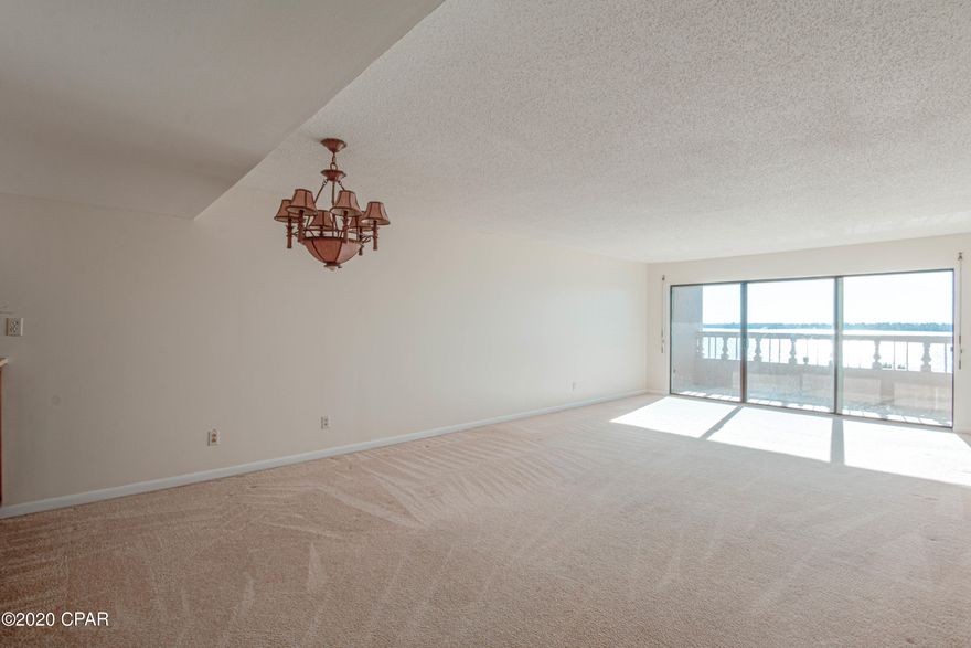 'CURRENTLY UNDER CONTRACT, SELLER ACCEPTING BACKUP OFFERS' must be placed at the beginning of the Public Remarks.  Now you can wake up with the most amazing Bay views in this vacant 2 bedroom, 2 bathroom Bay front condo in the Cove available now for your luxury waterfront living.  With 1,250 square feet, this condo will comfortably accommodate your family.   Close proximity to St Andrew State Park, public beaches, golfing, marinas, boat slips and storage, pontoon boat and jet ski rentals, charters & tourist attractions & fine dining. Ready for its new owner to make their own. Owners may have pets. Prime waterfront location.   **Age, dimensions and square footage are approximate. Buyer should verify if important.**