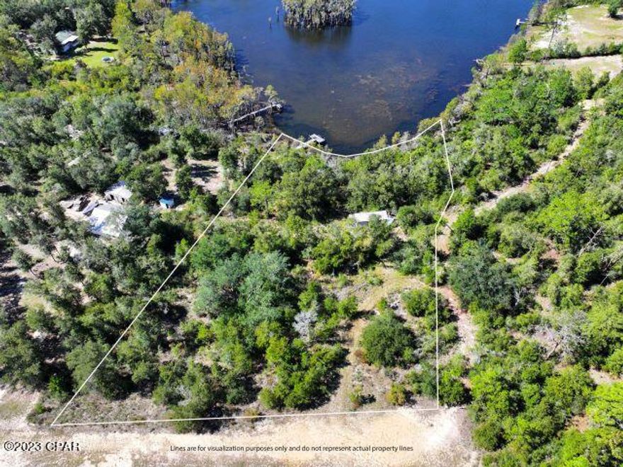 WATERFRONT on just over 1 acre on Bear Pond.   There is nearly 180 feet of waterfront ready for you to enjoy. This is the perfect getaway from the city, perfectly hidden in the woods in the country.  There is an older mobile home that needs to be removed.  Call today to see this one.