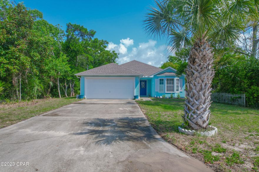 Charming 3 bedroom, 2 bathroom home located in a desirable coastal community within walking distance to the beach. With 1,464 square feet of living space this home offers both comfort and convenience. Highlights include a new roof installed in 2018, a 2 car garage, newly painted exterior and a spacious privacy fenced back yard. This home's location is close to Pier Park shopping mall, popular dining, great schools and the beautiful white sandy beaches. The kitchen with a new refrigerator to be installed flows into the dining area and the great room providing plenty of comfortable space with a fireplace. You'll love the size of the master bedroom that provides a walk-in closet and a private master bathroom. The other two rooms also provide plenty of space for sleep, study and guests. Entertain friends and family in the large back yard, perfect for get togethers while grilling under the covered patio. Call to schedule a private showing today!