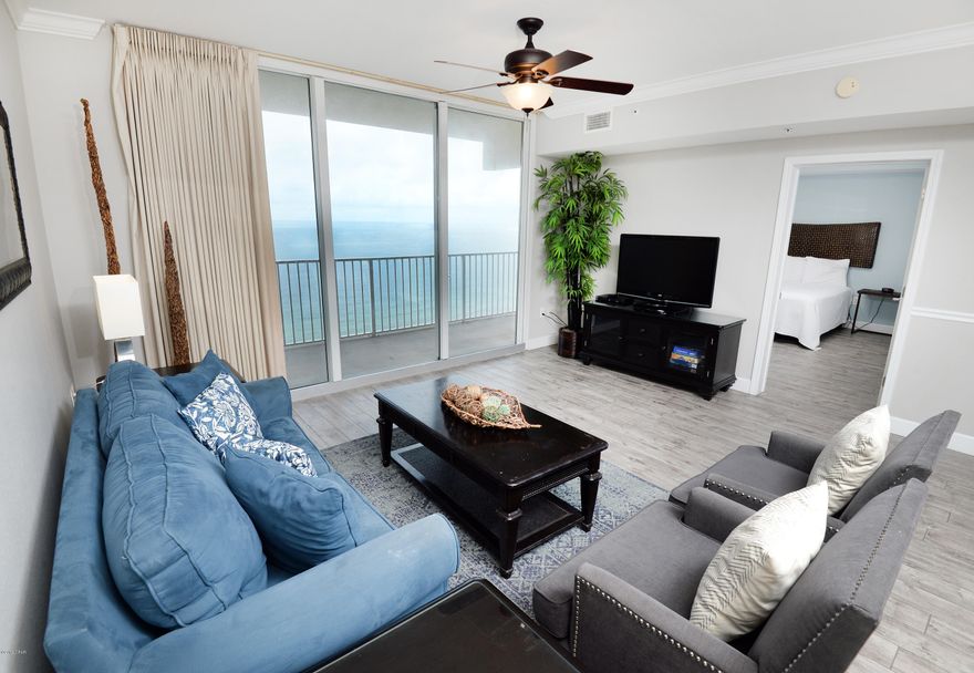 Enjoy one of the resorts with the most amenities in all of Panama City Beach-TIDEWATER! Unit 1915 is a nicely furnished 1br/2ba gulf front condo at this mega-beach resort that also includes a medium storage unit. Stunningly excellent 180 degree panoramic views of the sparkling emerald green gulf waters and white sand beaches from sunup to sunrise. Close to the east end of the building, unit 1915 offers 923 sf of pure comfort. The unit can sleep 6 comfortably and is tastefully decorated, featuring distressed wood ceramic tile throughout for easy care maintenance. Two full bathrooms for your convenience. Great rental investment property with on-site rental desk. Tidewater is a vacation rental dream with 2 outdoor pools, indoor pool, tiki bar, restaurant, steam/sauna, fitness room, full movie theater, convenience store, beach service, gift shop, covered garage parking and on site rental and assoc. mgt. Located just west of the nearby Pier Park Shopping Mall and all area dining and activities. Unit 1915 at Tidewater is a MUST SEE!  Exclusions: Free standing tall wood decorative pieces in the living room.