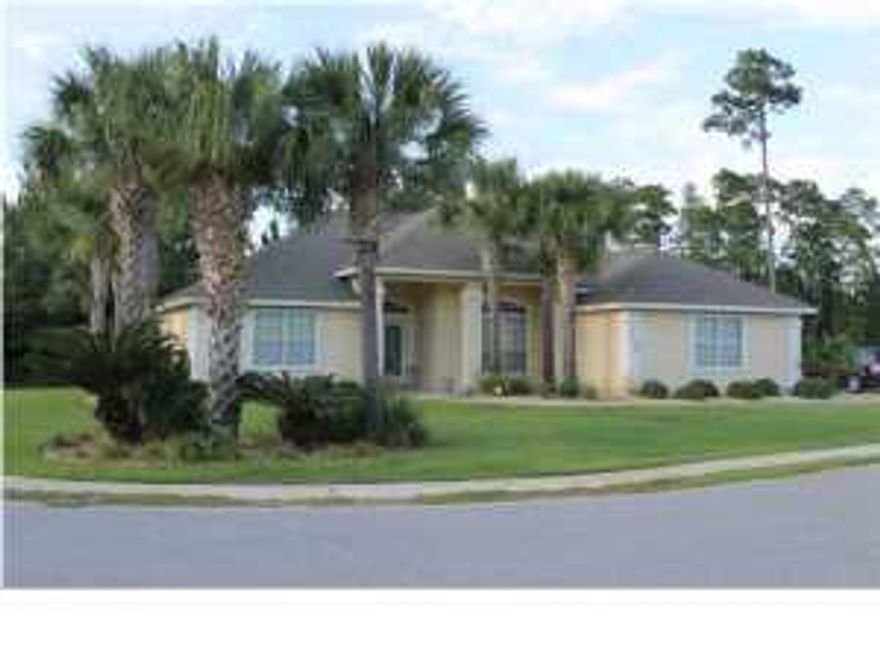 Fantastic find! This is a corner lot four bedroom, two and a half bath split bedroom home located in the gated community of Dolphin Bay. Dolphin Bay is a water front community with boat access and marina. The community also features tennis courts and sidewalks. Just a short drive to the Navy Base, shopping, dining and the beach! The home features all tile floors, fire place, two screened patios (one covered), two car garage, and large open great room with breakfast bar. The master bedroom features private exterior entrance to screen patio, and separate tub and shower with double vanity in the bathroom.