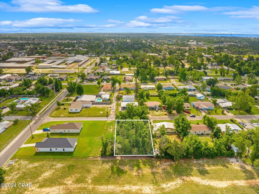 Seize the opportunity to build your dream home on this outstanding residential lot, perfectly situated for convenience and active living. This prime location is within walking distance to Parker Elementary School and backs up to the expansive Parker Sports Complex.
Zoned Residential for development of a residential home.
Nature enthusiasts will appreciate the proximity to the Parker Environmental Exploratorium, offering scenic trails, educational exhibits, and a nearby boat ramp. This property is also only a 7-minute drive to Tyndall Air Force Base, making it an ideal choice for military personnel or professionals working at the base.
Settle into a vibrant community surrounded by natural beauty and endless outdoor activities. This lot provides the perfect setting for those seeking an active and engaged lifestyle.
While there are currently no utilities active on the lot, the City of Parker has confirmed that connecting to the necessary utilities is straightforward, with appropriate tap fees required to access the lateral lines. 
Don't miss out on this exceptional opportunity to build your home in a highly sought-after area.