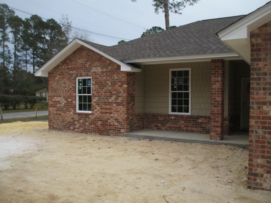 POSSIBLY 100% Financing for a VA Loan, and Also may Qualify for a 100% USDA Loan for ELIGIBLE Customers. NEW CONSTRUCTION on a Corner Lot in Lynn Haven. Home has 4 BED, 2 BATHS, WITH A SPLIT FLOOR PLAN, to include 8, 9, & 10 FOOT Ceilings. ALL Electric Appliances. Master Bath has Separate Soaking Tub & Shower. Front and Rear COVERED PORCHES...  NEW FENCE ALREADY INSTALLED for Privacy and, or PETS...