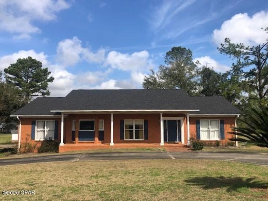 ** PRICE REDUCTION **  Beautiful home in great neighborhood! In addition to the main house there is a 19x24 apartment with hook up for stove and space for refrigerator; has it's own bathroom; just right for mother-in-law suite, mancave or utilize it for 4th bedroom. There is a 2 car attached carport, large deck and nice shaded lot. The main house has large great room with fireplace and built in bookcases. Has split bedroom design with large master suite, with jacuzzi tub, separate shower and double vanities. The kitchen is fully equipped with smooth surface range, refrigerator with ice maker, dishwasher and microwave. Some furnishings will remain. This is an excellent property so make appointment soon to see.