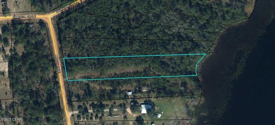 LAKEFRONT lot. Welcome to the Highlands of Compass Lake. This great lot has approx. 130' on beautiful Lake Highland. This is one of 3 side-by-side lots available.  The 2 adjoining lots have a different owner, but you can purchase 1, 2, or all 3 for a large getaway. (see MLS 695808 and 695810 for the other 2 lots). Let's make a deal!! Situated just inside Jackson County, Lake Highland is over 60 acres and offers pristine spring fed enjoyment. No gas-powered craft are allowed on this lake, but electric motors are welcome. For the angler, there is a variety of fish to be had. You are also less than a mile to the public boat ramp of the 600 acre Compass Lake, where fishing and skiing are everyday activities. Come see today and bring your fishing pole. Measurements are approximate.