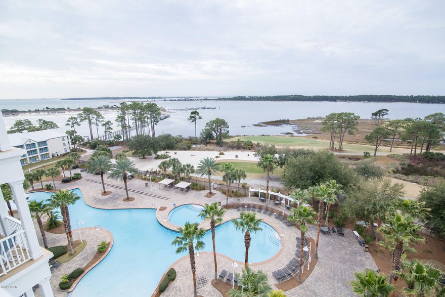 You will not forget the wonderful view from this top floor Reflections in Bay Point condo. Reflections 808 is a 2 bedroom, 2 bath condo in excellent condition. The Reflections in Bay Point features a large lagoon styled pool, serenity spa and fitness center and much more. Bay Point offers marina, tennis courts, 2 championship golf courses and 24 hour roving security. Reflections condo can be rented out short term with Sterling Resorts management company being right down stairs. Don't miss this opportunity to own this top level condo looking over Grand Lagoon, Bay and Gulf/Pass.