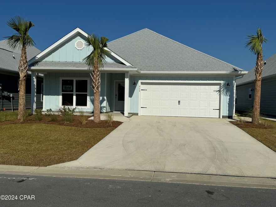 New home under construction at 564 Vermillion Circle. The Rhett is a single-story floor plan at Windmark Beach. On the exterior of the home, you will see beautiful Hardie Board on all sides as well as a sodded yard with landscaped front flowerbed. As you enter this 4 bedroom, 2 bath home, you will see a spacious living concept. The interior features 9' ceilings throughout and engineered vinyl plank flooring throughout the home. This home has tray ceilings in the living room and master bedroom per plan as an added feature, granite countertops, and elegant doors. The kitchen has a center island with granite countertops, a nice size walk-in pantry and the stainless-steel appliances include smooth top range, microwave, and dishwasher. The kitchen opens to the living room, making your home more comfortable and open. The primary bedroom has its own bathroom featuring a spacious walk-in closet, a double vanity with granite countertops, and a separate shower and tub. Whatever room in this house you're in, you will feel right at home. This community features a town center complete with food, shopping, a gym, and more. There are sidewalks, boardwalks, bike paths, golf cart paths, and beach accesses along with a large two community pools and breathtaking views of the Gulf of Mexico. Homes are subject to prior sale or rent. Home and community information, association fees (if any), included features, terms, availability and amenities, are subject to change at any time without notice or obligation. Drawings, pictures, photographs, videos, square footages, floor plans, elevations, features, colors and sizes are for illustration purposes only and will vary from the homes as built. Landscaping and furnishings may be decorator items not included in the purchase price and may not be available.