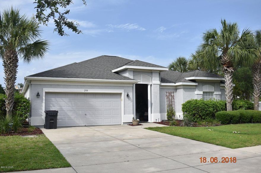 4 bedroom, 2 bath home in Palmetto Trace. 

 Kitchen is beautiful, with upgraded cabinets, stainless steel appliances. Fireplace-electric, 2 car garage.   2 community pools. Dog ok with approval and $250.00 refundable deposit, Yard Care and Garbage included. Near beaches, Pier Park.