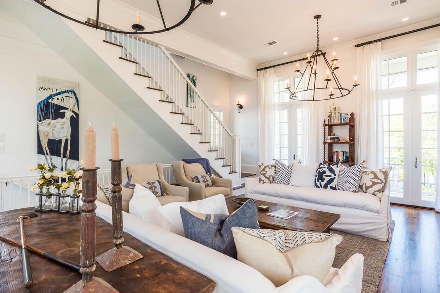 Gorgeous home completely remodeled in Rosemary Beach south of 30A! Fantastic location! Just a few steps to the beach and town center. The first floor includes two bedrooms, two full baths and a hallway bunk. The second level is made for relaxing or entertaining, with a gorgeous open floor plan (living/kitchen/dining), and floor to ceiling windows allowing plenty of natural light. The beautiful gourmet kitchen features white marble and Thermador appliances. The third floor is a large master suite and sitting area, with views of the Gulf. Enjoy the breezes on one of the large wrap around balconies or screened living area, complete with wet bar. 1600 sq. ft. of porches, lush landscaping and a heated spa pool, make this home the epitome of coastal living. Call to schedule an appointment today!