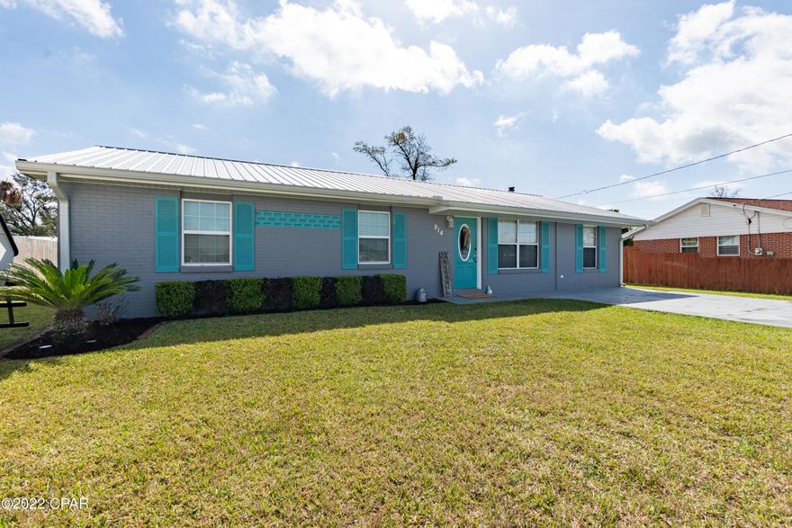 Welcome Home and come right in to the best looking home on the block! This remodeled home features so many amenities and all at a price that you will love.  Let's start with the good stuff. The large Master Bedroom features an ensuite bath to die for. Zen is the word that comes to mind when you step into the modern soaking tub with chandelier above. The black glass and tile shower with glass door will be the envy of all of your friends. Double Vanity...you've got it. The kitchen features a glass tile backsplash with a stainless appliance suite. The 13x25 living area has a modern wood burning stove in the corner set atop beautiful bamboo flooring and chair rail is run throughout the home. Would you like a 20x25 workshop with concrete flooring plus an additional storage shed out back? What about the safety of a security system? Speaking of your family...Do you need a lot of hot water? Well the gas operated on demand hot water system is there for you.  The concrete drive is especially wide for those visiting your home. There is a new aluminum roof on this home that will provide year after year of worry free comfort. This home is built like a tank with 5/8 tongue and groove sheeting on roof and walls, 2x12 truss beams and 2x6 gable beams. What are you waiting for? Call today and visit this deal before it gets away.