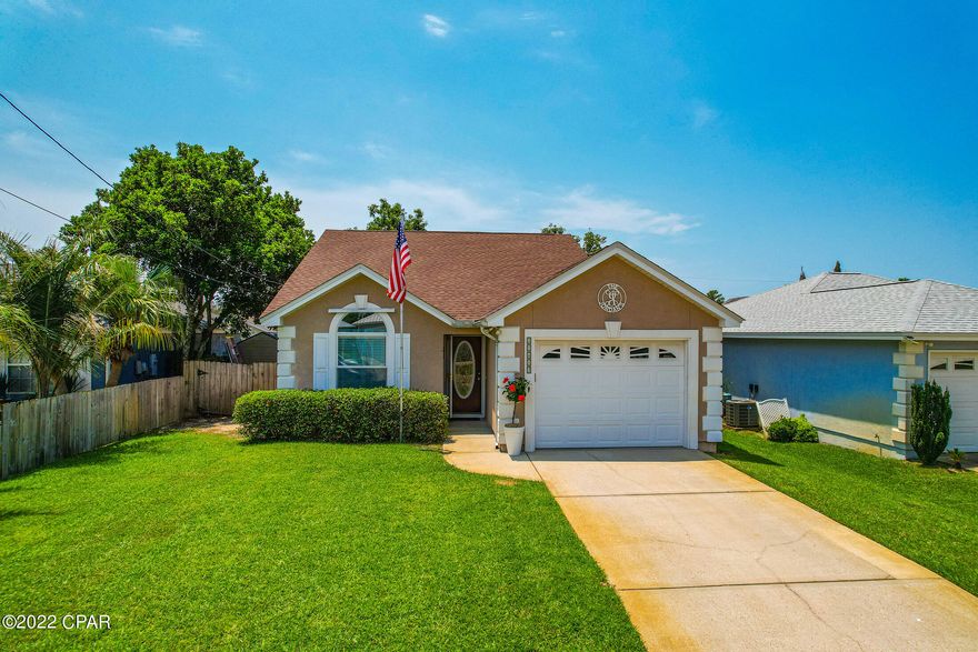 'CURRENTLY UNDER CONTRACT, SELLER ACCEPTING BACKUP OFFERS'  Fantastic Opportunity to own a primary home, second home or vacation rental in the highly sought after Riviera Beach.  This charming home is quietly tucked away between 30A and Pier Park on the West end of Panama City Beach.  Features include a spacious enclosed porch overlooking a lush and shady backyard, two bedrooms, two baths, laundry room, open kitchen dining and family room, plus a garage for all of your  beach equipment.  Roof new in 2018 and home well maintained.  *All important listing data should be verified