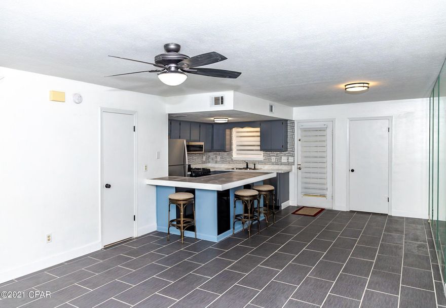 Completely renovated townhome in the popular Gulf Highlands complex. This unit includes new ceramic tile flooring throughout, as well as new appliances and new landscaping. This unit could be used as a personal residence or an investment property with beach access.