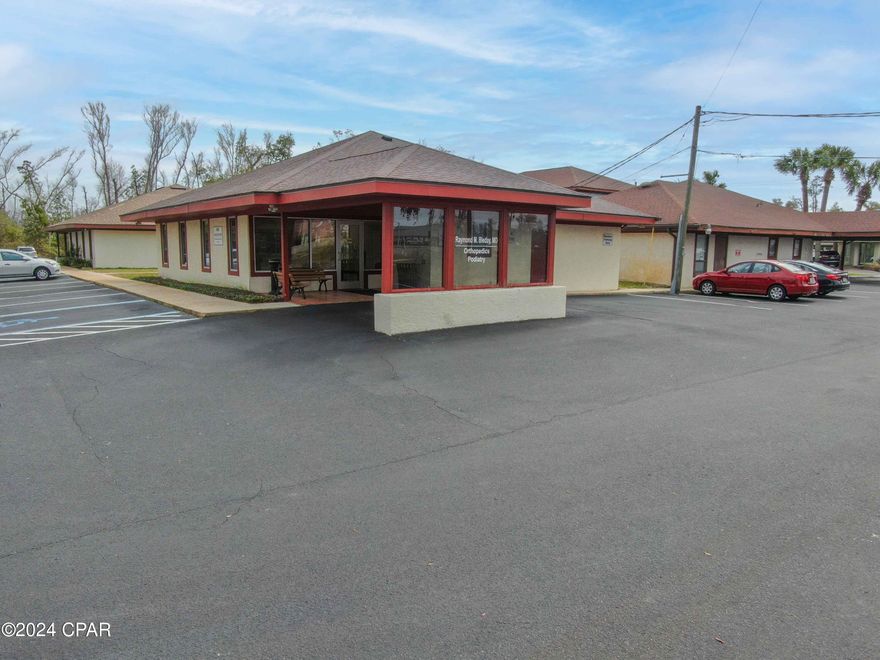 Medical Office Condominium located in the heart of Panama City, only 1 block south of Gulf Coast Hospital. This medical office condo includes an open receptionist area, waiting area, 4 exam rooms, private office, equipment room, locked supply room and 3 bathrooms. Plenty of storage in this office and it is turnkey with furniture being included in the sale. Building does have common areas that can be used by tenants such as conference room and storage area. Building is getting new paint on the exterior and in the common interior areas. Also soffits and eaves are being updated.