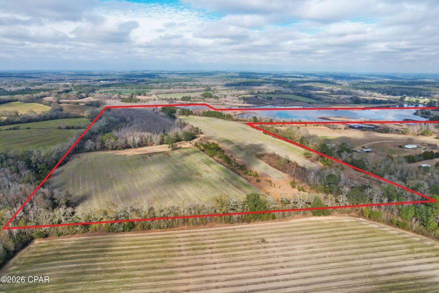 An exceptional opportunity to own approximately 120 acres of versatile North Florida land featuring a sizable private lake ideal for fishing and outdoor enjoyment. This expansive tract offers a balanced mix of open acreage and natural landscape, making it well suited for agricultural use, recreational pursuits, or a private rural retreat.

The property is well positioned for farming and land management, with strong potential for hay production, row crops such as soybeans or corn, and use as productive farmland. Hunters and outdoor enthusiasts will appreciate the ample space and natural habitat, while the lake adds both recreational value and scenic appeal.

Well and electric utilities are available, enhancing the property's usability while preserving its rural character. Conveniently located in Westville, this property provides peaceful seclusion with reasonable access to surrounding towns and the Northwest Florida region.

A rare offering combining acreage, water features, and multi-use potential—ideal for agriculture, recreation, or long-term land investment.