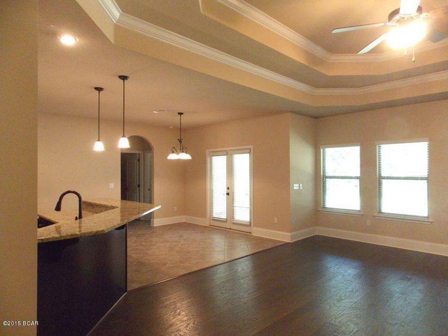 McKenzie. The McKenzie floor plan is absolutely our bestselling plan and is the model home in Cherokee Heights. Upon entering the foyer you will realize that this home is like no other. The wide foyer with double arches setting off the dining room is every elegant. From the front door you can see straight through the family room to the back yard. The family room and kitchen are open to each other with a long wrap around bar dividing the space. This home was designed with entertaining in mind. You will love preparing family meals in the gourmet kitchen with stainless steel appliances, 3 cm granite, designer cabinets, and a huge island. There is a covered back porch the length of the family room and nook which will make entertaining outside enjoyable. The master suite is huge with everything one is looking for: garden tub, separate shower, linen closet, and walk in closet, water closet, trey ceiling and an entry way onto the back porch. With double bedrooms and adjoining baths for the four secondary bedrooms you will feel like there is space for everyone. This home is a must see, call today and find out about our special incentives.