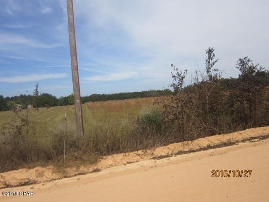 One 5 acre lot, located in a former cultivated field, surveyed and described out of a 40 acre tract.  Property will be deed restricted to Site Built Home or NEW doublewide Manufactured Home.  Only  1/4 mile off Hwy 77 and convenient to Chipley and WalMart shopping and only a short distance to Panama City and the Beaches.  Seller is a licensed Real Estate Broker, some owner financing is offered.