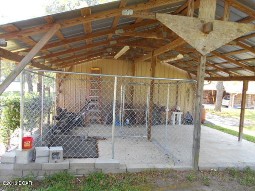 Super Estate Home on GORGEOUS 9 Acre Mega-Lot! Room for horses! Includes Dog Kennel! On TWO PAVED ROADS, Howell Rd-Front, Lake Seminole Rd-Rear & zoned 1 home/acre! IT is Across Lake Seminole Rd from 38,000 Acre Lake Seminole! View Apalachee WMA! 2121sf H/C 3/2 Home that has 2,835 under roof of main home! PLUS Three more large concrete floor, enclosed shops (garages-boat storage-vehicle storage-or man-cave!) WOW! Plus Two 4'' deep wells, 1 is high capacity well! Two more sheds along with the 3 shop buildings! Processing Room is 23'x28', finished with refrigerator and cabinets! Yes this attached-to-concrete floor ultimate barn is an easy conversion into a Mom-in-law suite or separate Guest House!! Super-Quality local schools!! For MLS Comp purpose only.