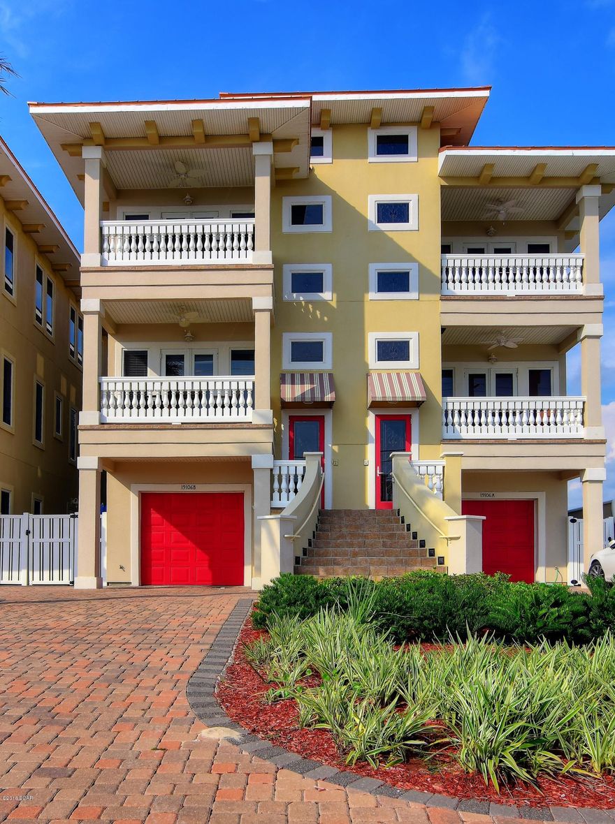 Absolutely gorgeous duplex with amazing views from every room across from deeded beach access. This luxury home features a gourmet kitchen with Viking gas stove top range, top of the line KitchenAid appliances, granite countertops, custom cabinets, a breakfast bar, dining area with gulf views, living room with French Doors opening up to the relaxing Balcony with Italian balustrades that overlooks the emerald green waters and sugar white sandy beach. Enjoy coastal living in this 5 bedroom 5 1/2 bath gulf front home with its own private pool, hot tub and separate guest quarters. This home even has an elevator!