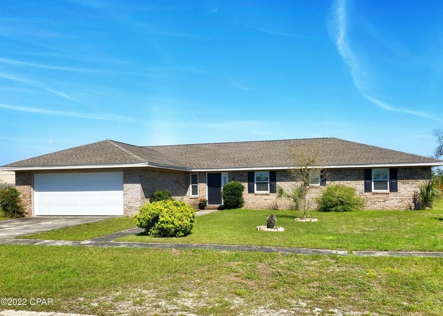 BACK ON THE MARKET— Buyer's Financing Fell Through!  OUTSTANDING 4 BEDROOM All-brick home in Callaway Bayou Estates, beautifully remodeled from top to bottom. MOVE-IN READY for you! Livingroom has bay window overlooking back yard. Large Family Room with tall beamed cathedral ceiling, brick woodburning fireplace and open to the large, modern kitchen. Granite countertops, kitchen island with breakfast bar, new cabinets, all new stainless appliances. Upgraded light fixtures and beautiful luxury vinyl plank flooring throughout the home. Oversized dining room and two-car garage off of the kitchen. Four large bedrooms have great closet space, including double closets in the master suite. Very beautifully done inside, a perfect home for Tyndall AFB family.BRAND-NEW ROOF!