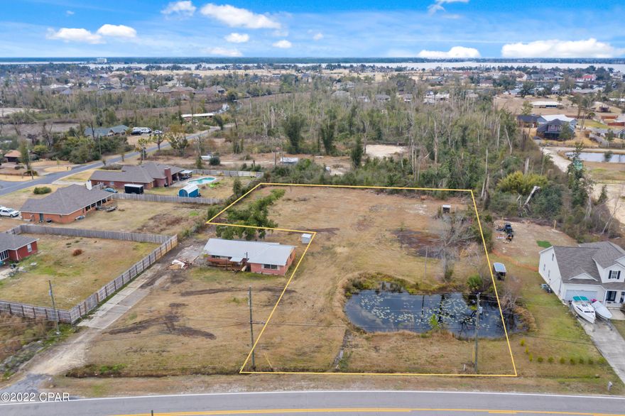 Over an acre, mostly cleared lot in Lynn Haven! There are many opportunities with this lot. It is the perfect place for a large home-site with a pond, or use it as an investment and divide it into multiple lots. The way it sits now Planning & Zoning said it can be divided into two, and potentially up to eight lots total- buyer to do their own due diligence and verify information for current and future land use. There is a new survey available on the property. This location is blocks from the Bay and near all of the conveniences Lynn Haven has to offer. It is also close to several waterfront parks, boat ramps, and a short drive to the beach.