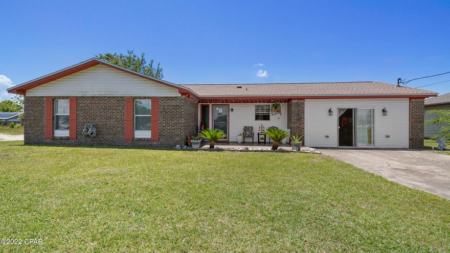 Move in ready; close to Tyndall AFB. This 3 bedroom 2 bath home has had many upgrades to include: roof 2019, upgraded ceiling fans throughout, tile and laminate flooring throughout, tankless water heater and shed. Kitchen offers black & stainless appliances and a walk in pantry. Master bedroom has walk in closet and an en suite. There are 2 additional bedrooms and a full bath.  There is a nice screened back patio. This home sits on a spacious lot with 2 sheds. 1 on a slab (post Hurricane) and 1 pre Hurricane. Garage would be easy to convert back but is currently used as storage. All info/sizes/measurements approx; please verify if importnat!