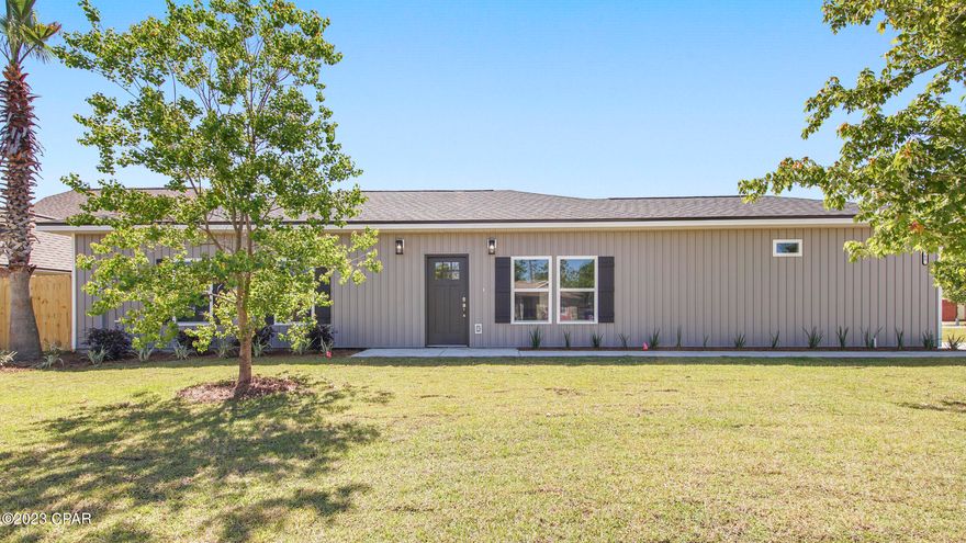 BEAUTIFUL NEW CONSTRUCTION CRAFTSMAN style home, conveniently located to TYNDALL. This spacious home is built in a traditional established neighborhood, NO COOKIE CUTTER HOMES HERE! The exterior offers a CHARMING BOARD AND BATTEN STYLE, a garage and sprinkler system. Once inside, you'll love the OPEN FLOOR PLAN with LVP FLOORING THROUGHOUT (no carpet here!), light and bright living area and nice  laundry room. The kitchen features WHITE CABINETRY, GORGEOUS QUARTZ COUNTER TOPS and a HUGE ISLAND, perfect for entertaining! The private primary bedroom offers a walk in closet and a great bathroom with double vanities and an elegant tile shower. 2 guest rooms allow for everyone to have their own space. The fenced yard is perfect for out door activities and pets! NO FLOOD INS REQUIRED and NO HOA's.