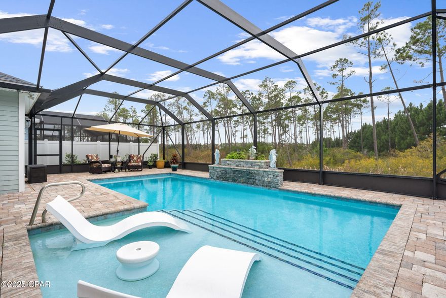 Welcome to 443 Locksley Drive, a rare opportunity to own a pool home with screened enclosure in the highly sought-after Breakfast Point community of Panama City Beach. This beautifully upgraded residence features 3 bedrooms, 2 full bathrooms, a dedicated office, and a 3-car garage, offering the perfect blend of function and luxury.

The spacious kitchen is open to the living area and includes a custom wine cooler, large island, quartz countertops, soft-close white cabinetry, and a customized pantry for optimal organization.

No detail has been overlooked as this home features surround sound, gutters, Teflon storm shutters, a sprinkler system, and under-cabinet lighting in the kitchen. It is also equipped with the Benjamin Franklin Lightning Protection System, which provides a low-impedance path to safely ground lightning strikes, an exceptional and rare upgrade. 

The guest bathroom includes a premium walk-in tub/shower hybrid, combining comfort, safety, and therapeutic design. The primary suite overlooks the serene pool and backyard, creating a peaceful retreat. The ensuite bathroom features a double vanity, a large tiled walk-in shower, and a customized walk-in closet for ample storage.

Step outside to your private saltwater pool with waterfall feature and sun ledge, outdoor fireplace, mounted TV, custom sunbathing chairs, and an outdoor shower, which is all within a fully screened enclosure for easy maintenance and year-round enjoyment. Beyond the pool lies a private natural backdrop with no rear neighbors, adding to the home's sense of tranquility. 

The three-car garage offers plenty of room for vehicles, a boat, or golf cart. A built-in tree hall with hooks and shelving is conveniently located near the laundry room, which includes a sink and additional cabinetry.

At the community entrance, there is a Publix located within the Breakfast Point Marketplace Shopping Center. With this location, you are near various neighborhood playgrounds, minutes from Duplin Winery, and only a short five-mile drive to Pier Park and Frank Brown Park for a plethora of shopping and recreational opportunities.  

Breakfast Point offers its very own Breakfast Point Academy (PK-8), and various recreational parks (Paseo Park, Azalea Park, Friendship Park, Grove Park, etc.) ideal for children and families.  Want to exercise?  Breakfast Point offers various sidewalks perfect for the avid runner or for an afternoon stroll with your pet. You can even take your bike on the muti-use path to Gayle's Trails from the neighborhood. 

This one truly checks all the boxes; modern finishes, functional spaces, and a resort-style backyard, all in one of Panama City Beach's most desirable communities. Schedule your private viewing today.