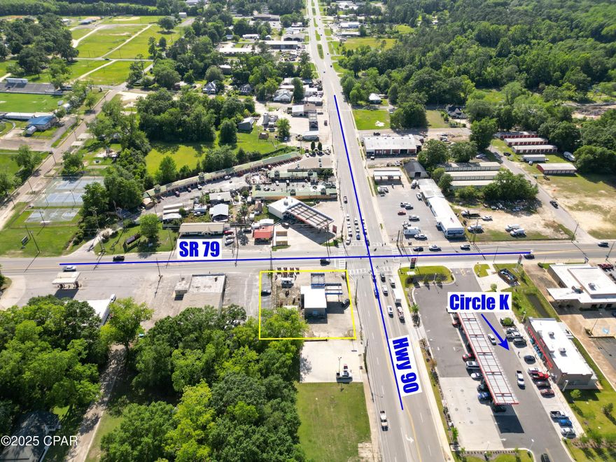 Looking to bring your business dreams to life? Don't miss this incredible opportunity at one of Bonifay's most high-traffic intersections! Previously home to Bonifay Motorsports, this versatile commercial property offers prime exposure at the corner of Highway 79 and Highway 90, directly across from the brand-new Circle K. The building features flexible interior space, ideal for a showroom, office, and parts/storage room—perfect for a wide variety of business ventures. Exterior restrooms add convenience for customers or staff.

Whether you're expanding your current business or launching something new, this property's unmatched visibility, strategic location and on-site parking make it a standout investment.  Please note: Fence and outbuilding are not included in the sale.