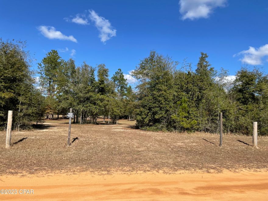 This is a beautiful 2.17 acres of land already cleared with a careful selection of trees that give the property lots of shade and vibrant colors in all seasons. Perfect for you to build your dream home. The property is near Compass Lake in the Hills subdivision and a short distance from Compass Lake where you have amenities that are as follows, water skiing, tubing, jet skiing, pontooning, power boating, sailing, wakeboarding, canoeing, kayaking, and swimming. Along the lakeside, a waterfront restaurant accessible by boat. This property is part of a voluntary Homeowners Association (HOA) with a low annual fee. With this fee, you gain access to the Lodge's pool, enjoy discounts on cabin room rentals, and benefit from additional perks.  Approximately 30 miles to the south, Panama City Beach offers public Gulf beaches and marinas, making it ideal for boating and water activities. Close to two well-known attractions near Chipley, Falling Waters State Park and Caverns State Park. Call your favorite Realtor to take you to see this absolutely Spectacular property!