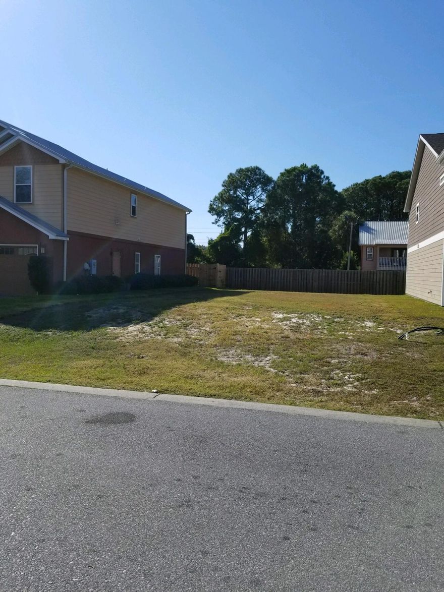 FANTASTIC price reduction on a great lot in one of the newest and most popular subdivisions on the east end of Panama City Beach. Seller is motivated and ready to sell! Build your retirement home, quaint vacation home or starter home. This is one of the last lots left on Panama City Beach in an actual subdivision.  Hidden Lagoon is conveniently close to the Navy Base and just minutes to the emerald green water and sandy white beaches.